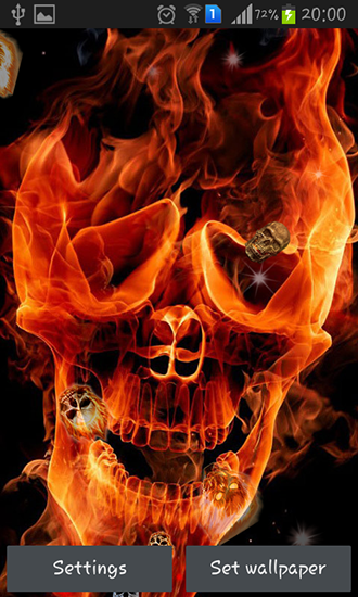 Скачать бесплатные живые обои для Андроид на рабочий стол планшета: Fire skulls.