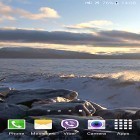Кроме живых обоев на Андроид Northern lights, скачайте бесплатный apk заставки Waves on rocks.